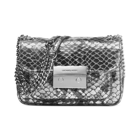 michael kors silver clutch|michael kors studded clutch.